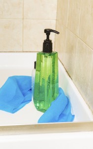 Liquid soap in shower to illustrate shower tips by Mini Mops House Cleaning